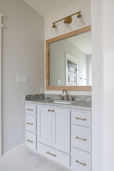 Representative furnished interior of a home built from the The Kaylee by Reece Homes in Pebble Creek, College Station (Image 40).