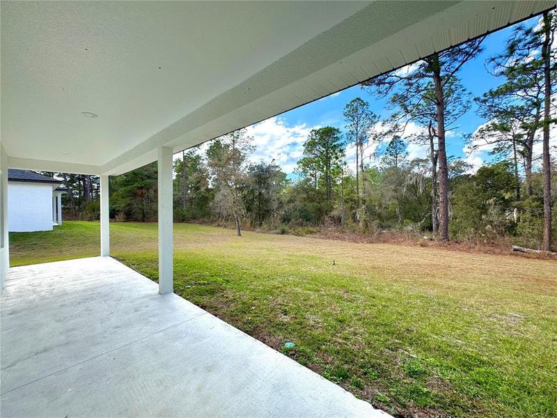 Exterior details and patio area of a home in , Citrus Springs (Image 4).
