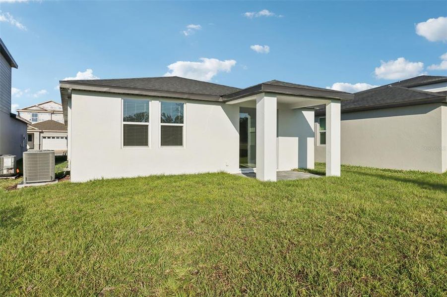 Exterior details and patio area of a home in The Reserve at Hammock Oaks - Classic Series, Lady Lake (Image 4). Exterior details and patio area of a home in The Reserve at Hammock Oaks - Classic Series, Lady Lake (Image 4).
