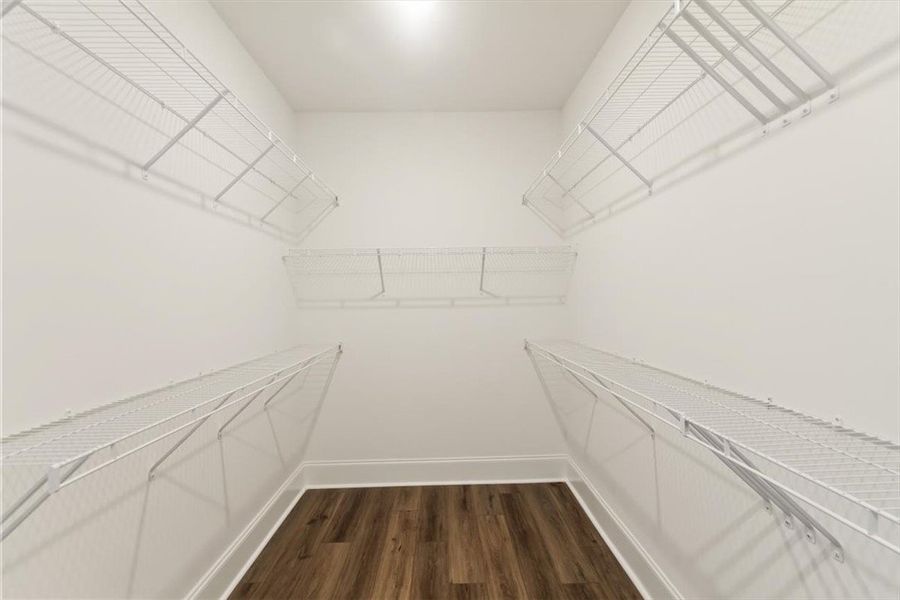 The master closet has ample wire shelving lines th