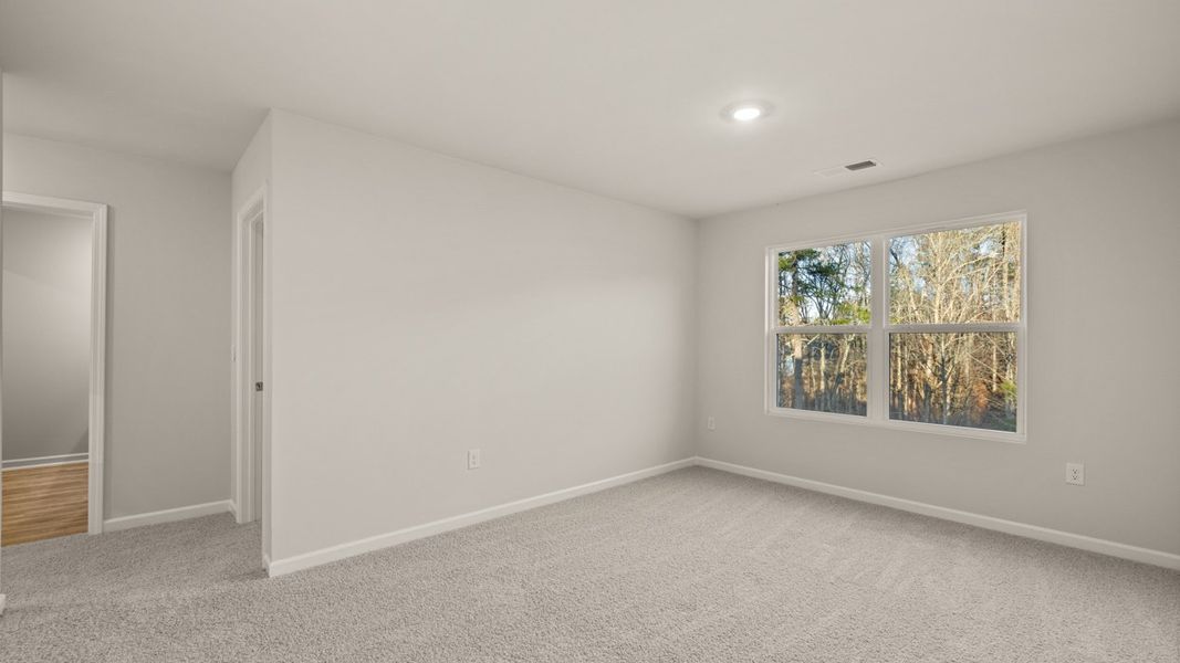 Spacious, unfurnished interior of a new home in Brooks Station, Dacula (Image 23).