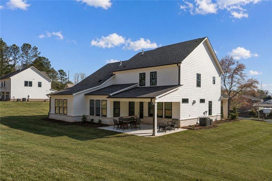 Exterior details and patio area of a home in The Reserve at Knollwood, Canton (Image 3).