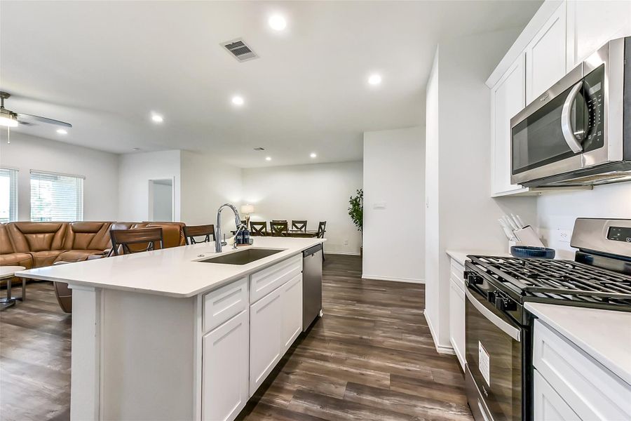 Furnished interior view inside a new home in Sunterra, Katy (Image 16).