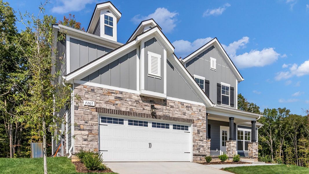 Front exterior of a new home in Brush Creek, Fairview, TN, highlighting curb appeal (Image 22).