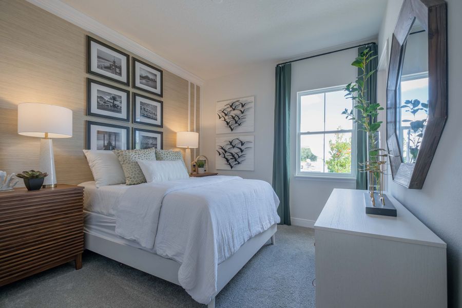 Representative furnished interior of a home built from the Flamingo by Jones Homes USA in Legends Preserve, Daytona Beach (Image 11).