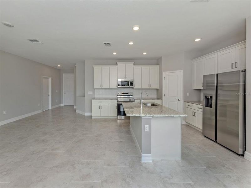 Furnished interior view inside a new home in , North Port (Image 14).