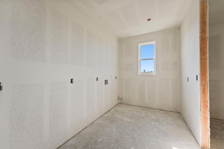 Enjoy the convenience of direct access from the laundry area to the primary closet. Enjoy the convenience of direct access from the laundry area to the primary closet.