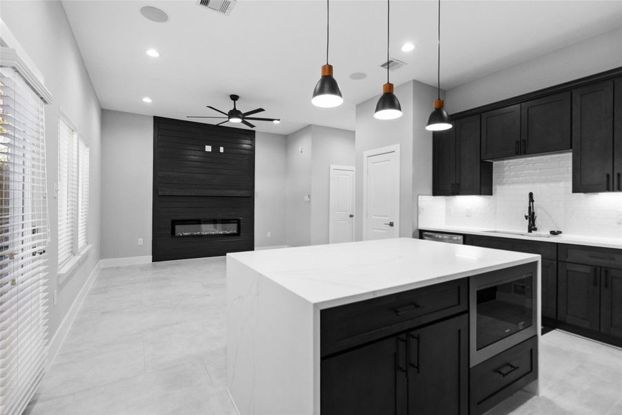 The island is more than a prep station—it’s where you serve dinner, help with homework, and gather around for casual nights in.