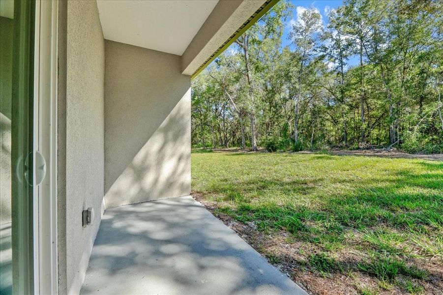 Exterior details and patio area of a home in , Citrus Springs (Image 3).