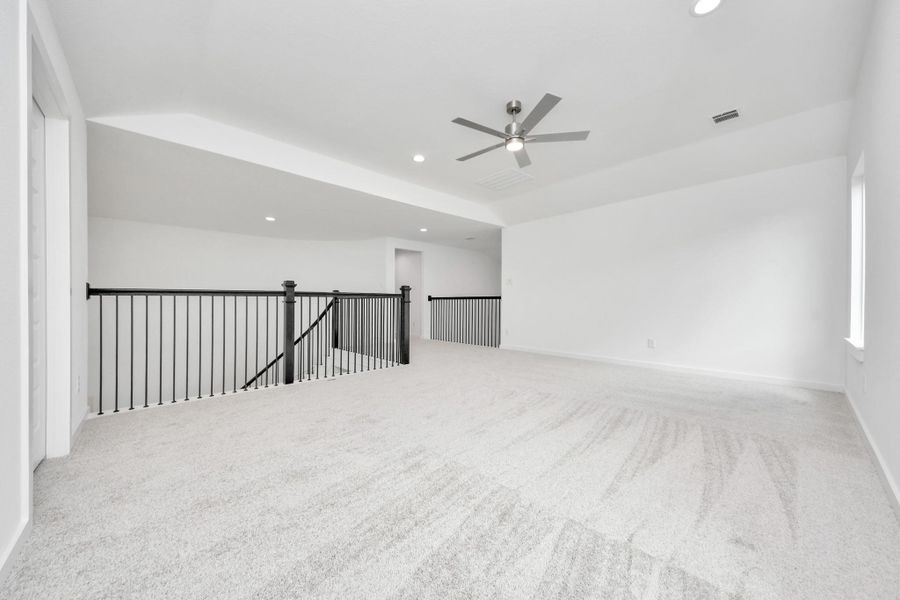 Ascend to relaxation in this fantastic game room! Ideal for both casual gatherings and adult gaming, it boasts plush carpet, lofty ceilings, custom paint, and ample windows for abundant natural light. Ascend to relaxation in this fantastic game room! Ideal for both casual gatherings and adult gaming, it boasts plush carpet, lofty ceilings, custom paint, and ample windows for abundant natural light.