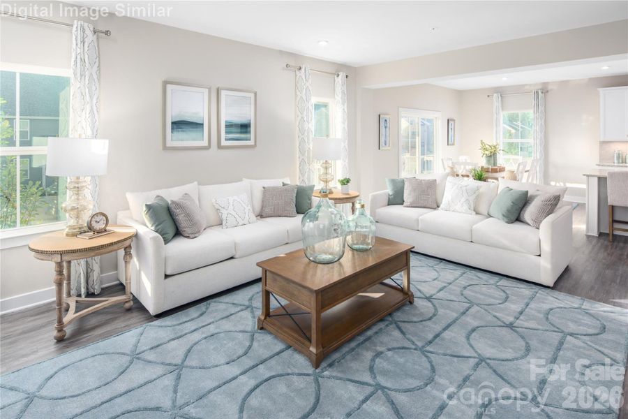 Connected spaces that inspire — a great room for entertaining, with a kitchen and dining area perfect for gathering. Connected spaces that inspire — a great room for entertaining, with a kitchen and dining area perfect for gathering.