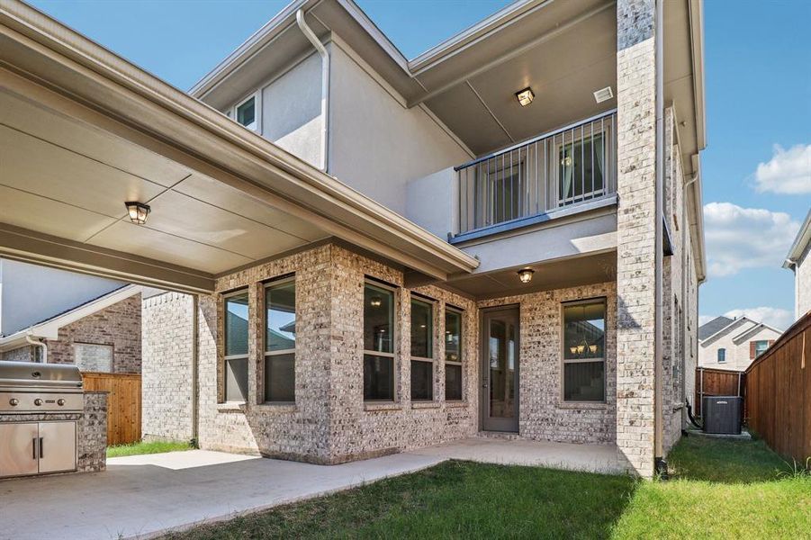 Patio / terrace featuring a patio area and grilling area Patio / terrace featuring a patio area and grilling area