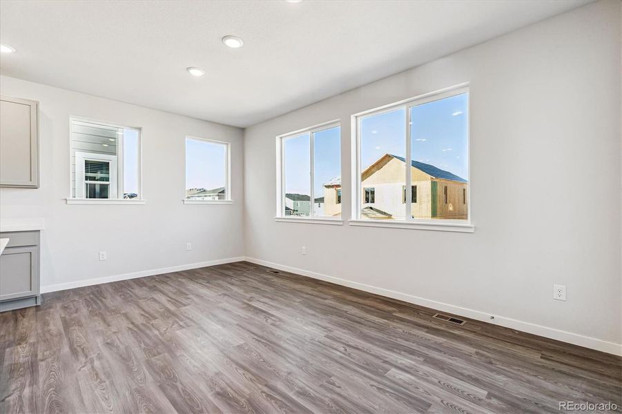 Spacious, unfurnished interior of a new home in Floret Collection at Alder Creek, Parker (Image 19).