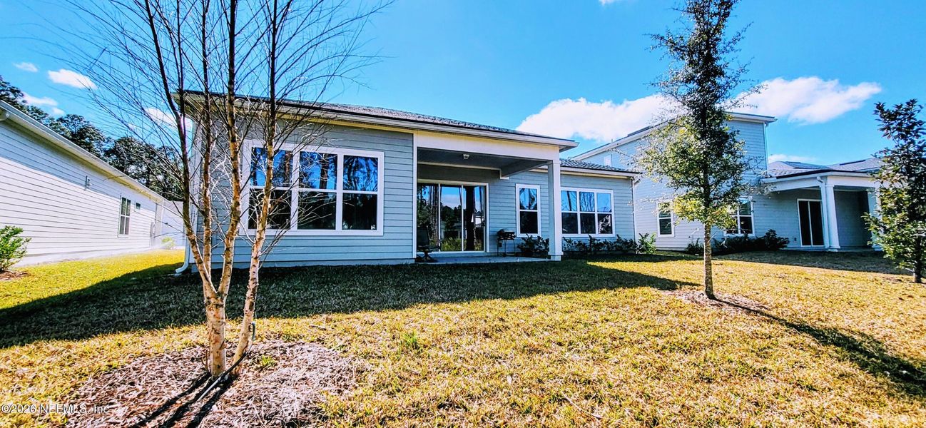 Exterior details and patio area of a home in , St. Johns (Image 32).