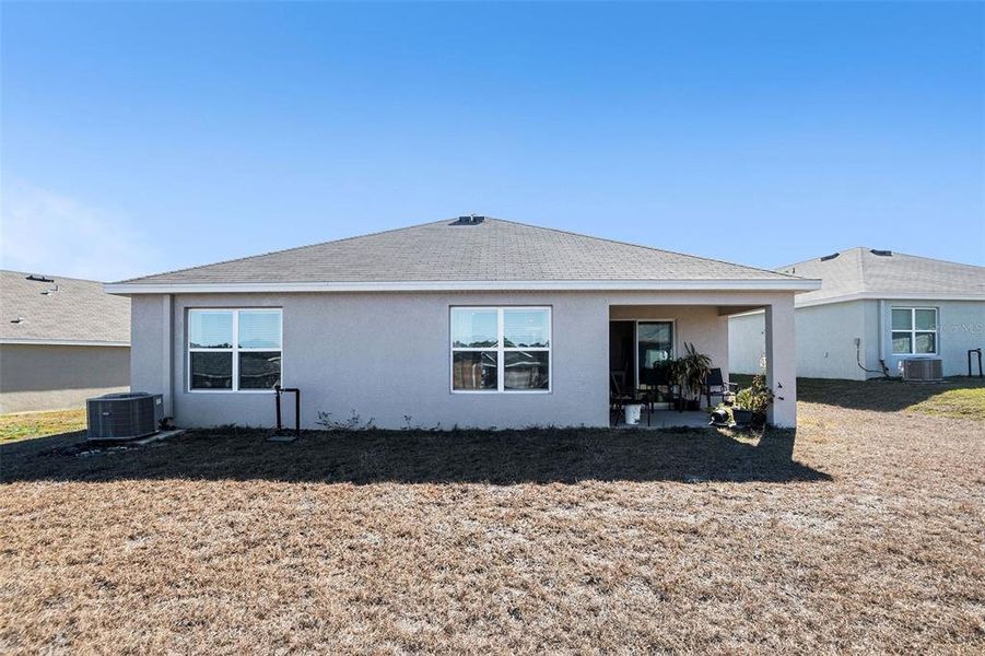 Exterior details and patio area of a home in Fairways at Twisted Oaks, Beverly Hills (Image 4).