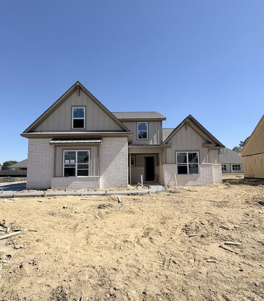 Gray brick and board and batten siding exterior