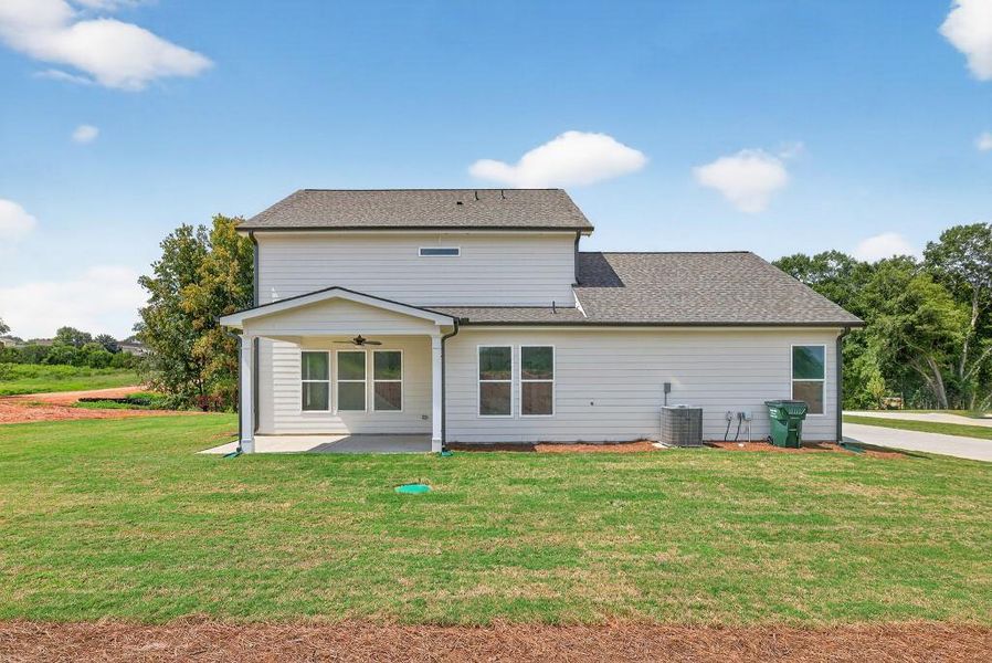 Front exterior of a new home in Magnolia Ridge, Monroe, GA, highlighting curb appeal (Image 23).