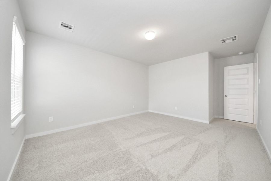 Generously sized secondary bedrooms featuring spacious closets, soft and inviting carpeting underfoot, large windows allowing plenty of natural light, and the added touch of privacy blinds for your personal retreat. Generously sized secondary bedrooms featuring spacious closets, soft and inviting carpeting underfoot, large windows allowing plenty of natural light, and the added touch of privacy blinds for your personal retreat.