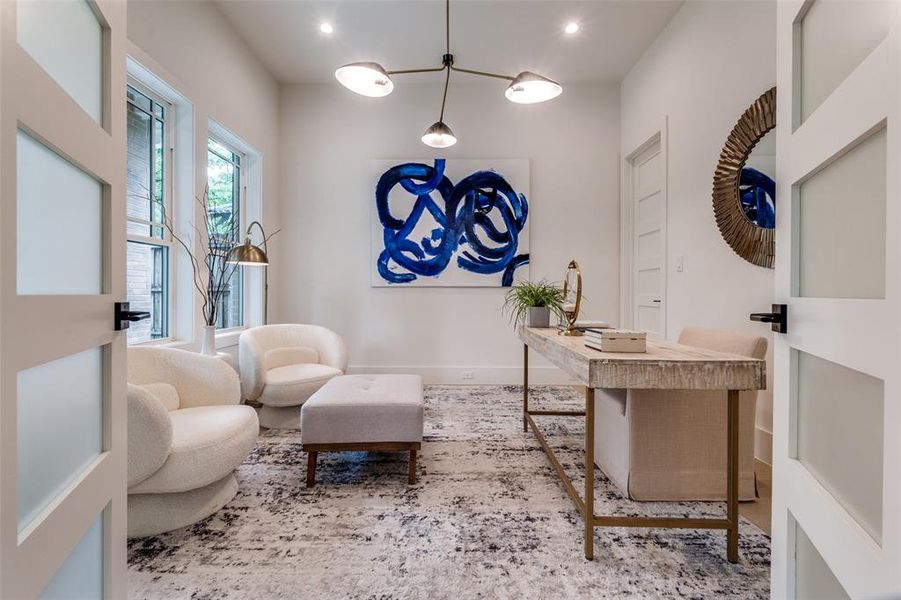 Office area featuring baseboards, recessed lighting, and wood finished floors Office area featuring baseboards, recessed lighting, and wood finished floors