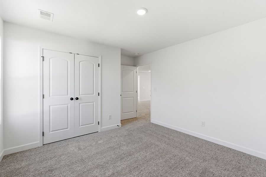 A room with white doors.