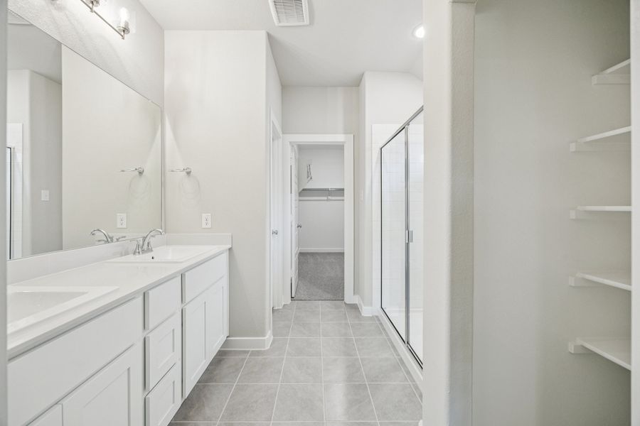 Primary Bathroom in the Oscar home plan by Trophy Signature Homes – REPRESENTATIVE PHOTO Primary Bathroom in the Oscar home plan by Trophy Signature Homes – REPRESENTATIVE PHOTO