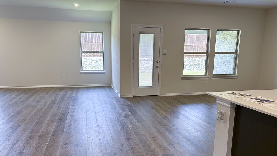Representative unfurnished interior of a home built from the GARLAND by D.R. Horton in Northspur, Forney (Image 9).