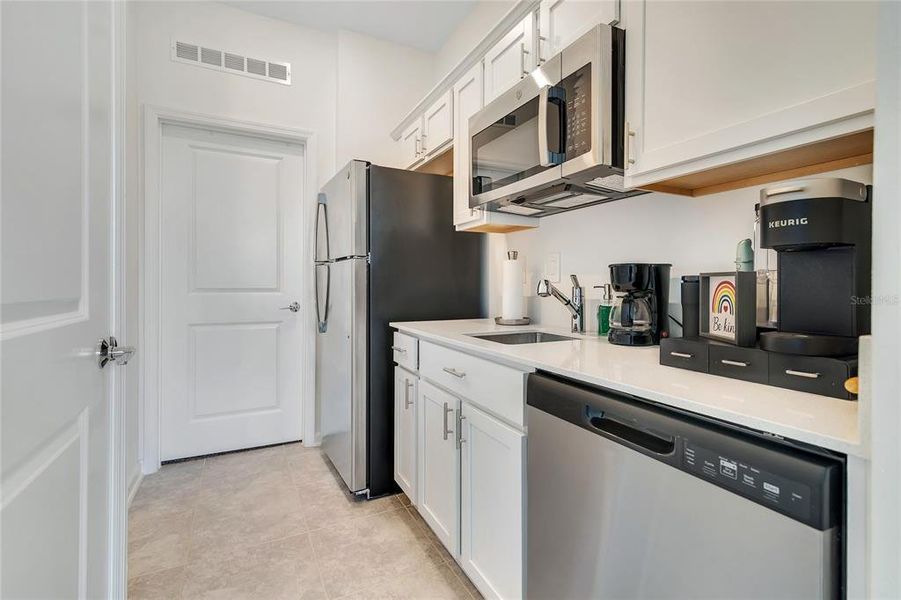 Furnished interior view inside a new home in , Kissimmee (Image 5).