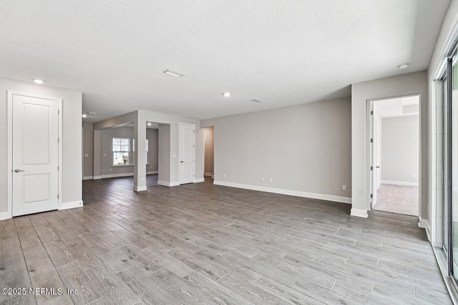 Spacious, unfurnished interior of a new home in Tributary 70', Yulee (Image 24).