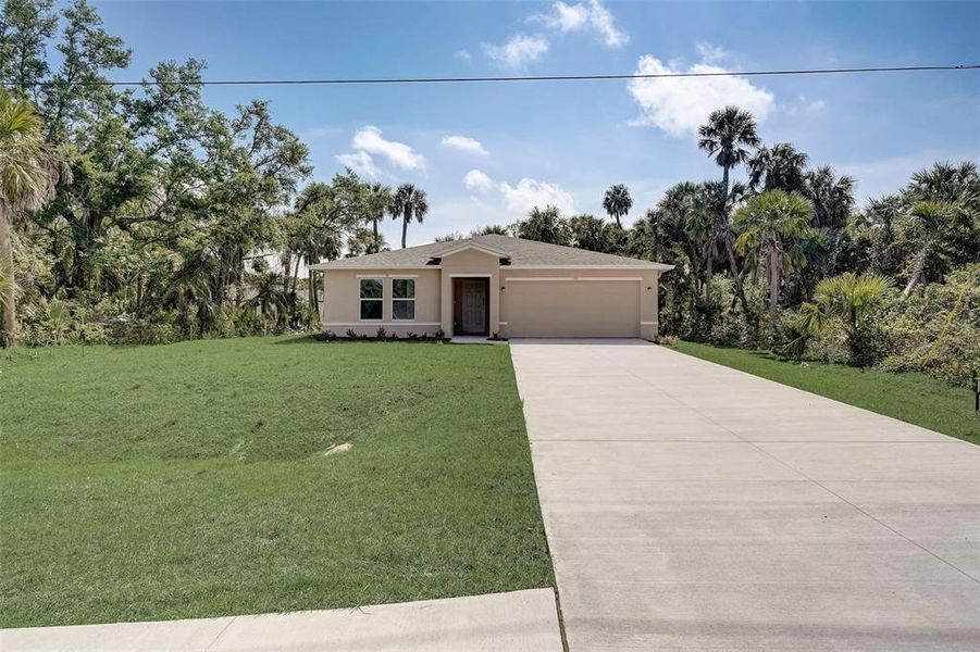 Front exterior of a new home in Citrus Springs, Citrus Springs, FL, highlighting curb appeal (Image 15).