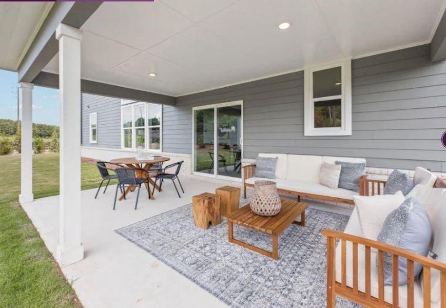 Exterior details and patio area of a home in The Estates at Gainesville Township, Gainesville (Image 2).