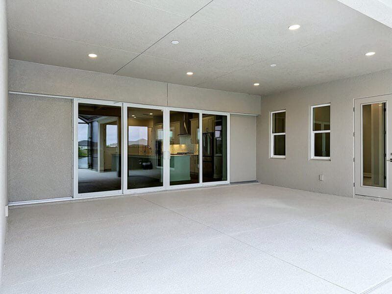 Exterior details and patio area of a home in River Preserve Estates, Parrish (Image 2).