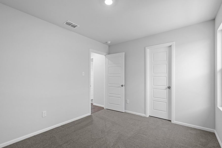 Representative unfurnished interior of a home built from the BELLVUE by D.R. Horton in Faculty Row, Abilene (Image 52).
