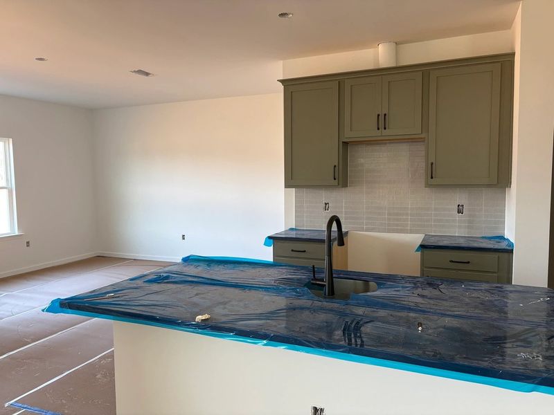 Kitchen featuring the AW Collection® Rosemary - Matte black, light wood, and garden-inspired style. Kitchen featuring the AW Collection® Rosemary - Matte black, light wood, and garden-inspired style.