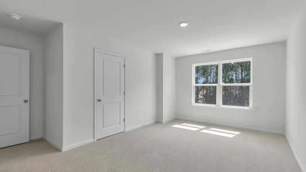 Spacious, unfurnished interior of a new home in The Townes at Prestleigh, Wake Forest (Image 23).