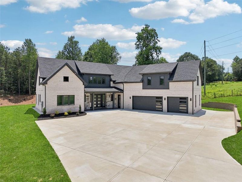 Front exterior of a new home in , Braselton, GA, highlighting curb appeal (Image 29). Front exterior of a new home in , Braselton, GA, highlighting curb appeal (Image 29).