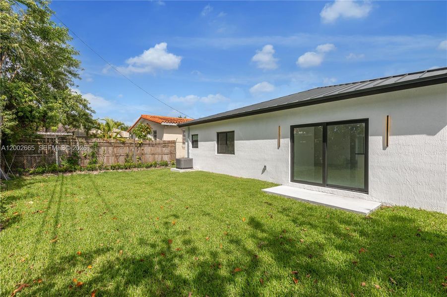 Exterior details and patio area of a home in , Miami (Image 4).