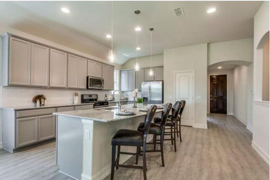 Photo of Pulte model home with same floor plan, not of actual home listed.