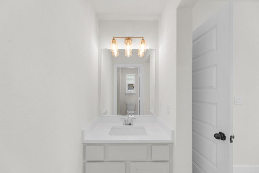 Furnished interior view inside a new home in Flora - 60', Hutto (Image 4).