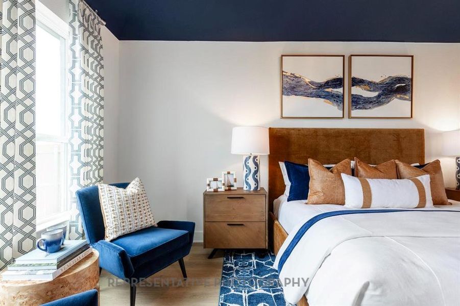 Bedroom with wood finished floors