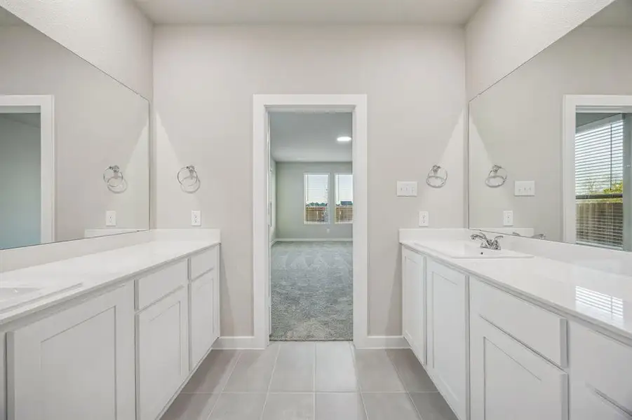 Primary Bathroom in the Wimbledon home plan by Trophy Signature Homes – REPRESENTATIVE PHOTO Primary Bathroom in the Wimbledon home plan by Trophy Signature Homes – REPRESENTATIVE PHOTO