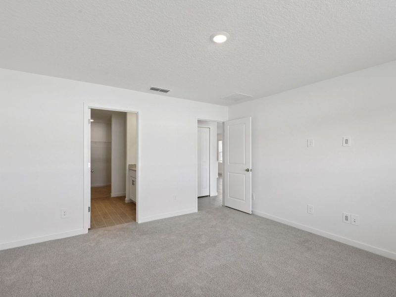 Spacious, unfurnished interior of a new home in Flagler Village - Classic Series, Palm Coast (Image 13).