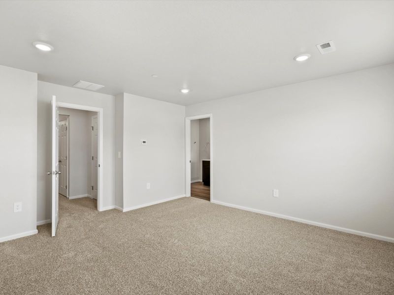 Spacious, unfurnished interior of a new home in Poudre Heights: The Meadow Collection, Windsor (Image 12).