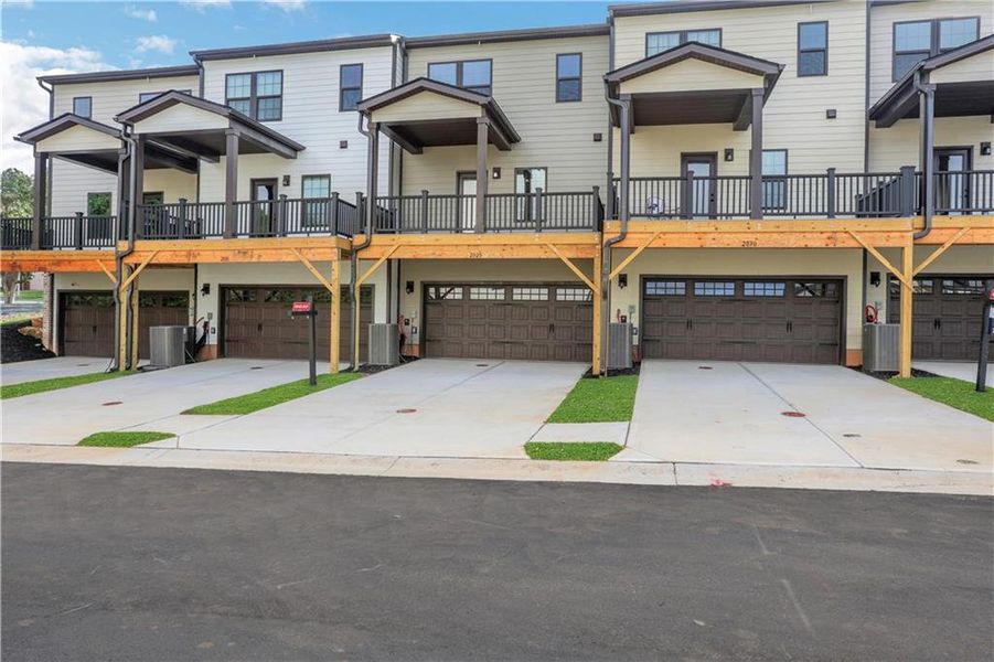 Front exterior of a new home in , Lawrenceville, GA, highlighting curb appeal (Image 1). Front exterior of a new home in , Lawrenceville, GA, highlighting curb appeal (Image 1).