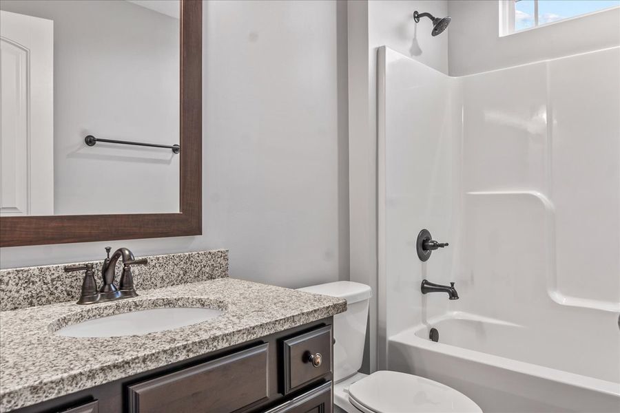 Representative furnished interior of a home built from the Whitney by Enchanted Homes in Ballentine Ridge, Lyman (Image 6).
