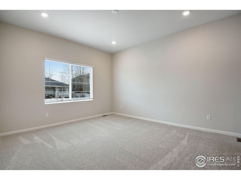 Spacious, unfurnished interior of a new home in Westside Crossing Paired Homes, Berthoud (Image 31).