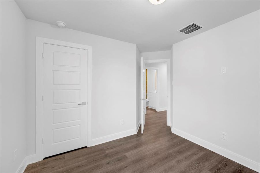 Spacious, unfurnished interior of a new home in Painted Tree Woodland West – Cottages, McKinney (Image 30).