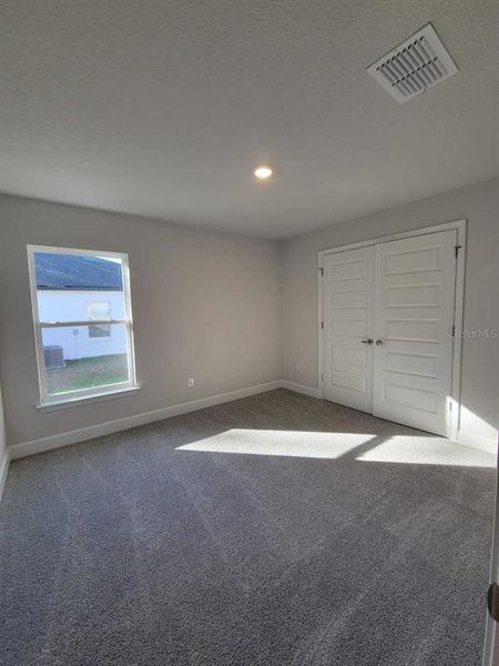 Spacious, unfurnished interior of a new home in Marion Oaks, Ocala (Image 22).