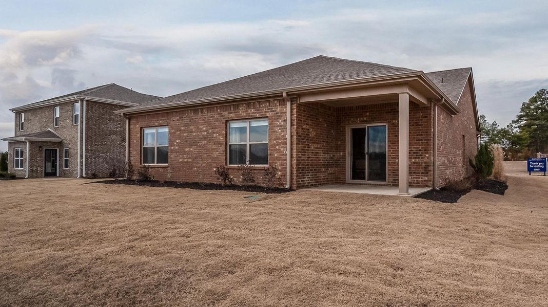 Representative exterior photo of a completed home built from the CALI by D.R. Horton in Riggs Pointe, Millington, TN (Image 2).