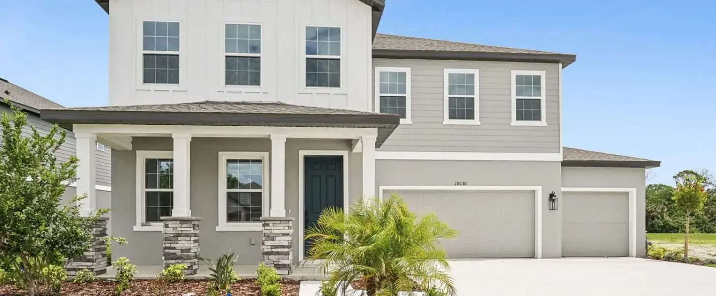 Representative exterior photo of a completed home built from the Griffin by Ashton Woods in Oakfield Trails, Parrish, FL (Image 1). Representative exterior photo of a completed home built from the Griffin by Ashton Woods in Oakfield Trails, Parrish, FL (Image 1).