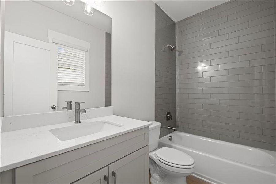 Furnished interior view inside a new home in Devin's Shire - A Kennesaw Tradition, Kennesaw (Image 7).